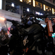 Police firing tear gas, which is now routine. Later in the night one fired a live round in the air as a warning—something that happened for the first time last weekend.